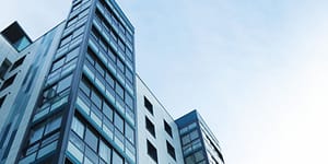 low angle view of office building against sky