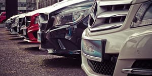 mercedes benz parked in a row